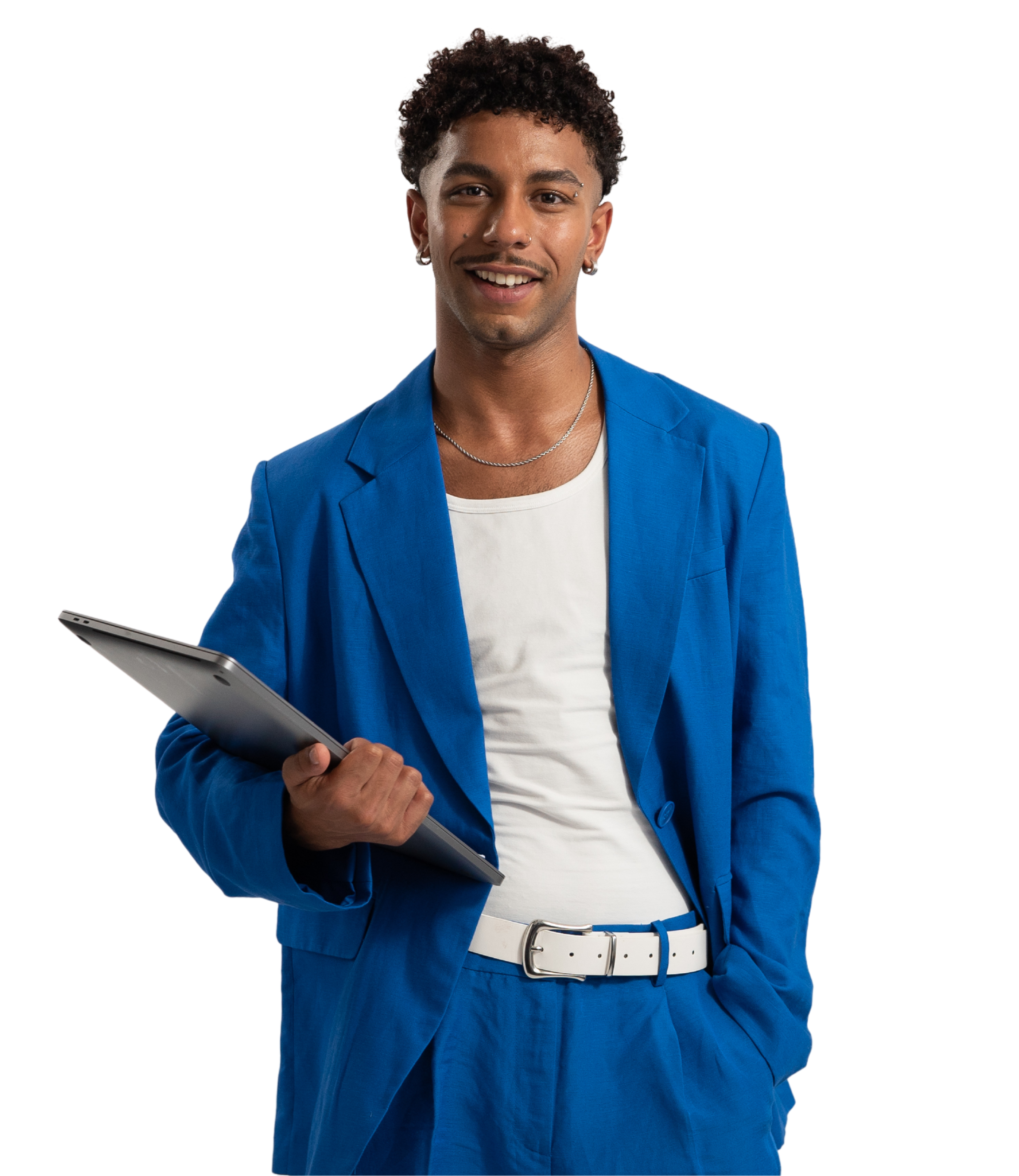 A man wearing a blue suit smiling and holding a tablet in his arm representing studying on a marketing apprenticeship.