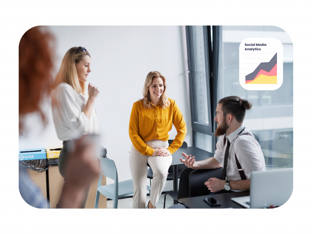 Team discussing social media performance as part of a content creator apprenticeship focused on analytics and digital marketing